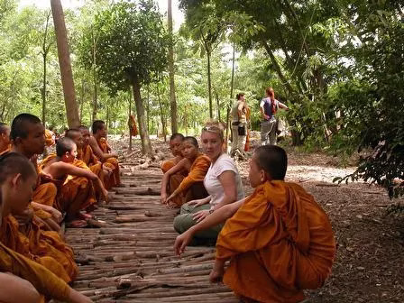 Globe Aware volunteers sharing a cultural activity with local children during an international volunteer vacation.